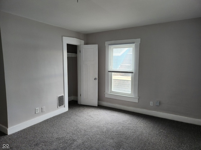 323-325 N Gladstone Ave, Indianapolis, IN 46201 - empty room with carpet and baseboards