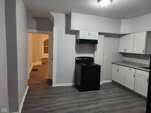 323-325 N Gladstone Ave, Indianapolis, IN 46201 - kitchen with black range with electric stovetop, baseboards, dark wood-style floors, and white cabinetry