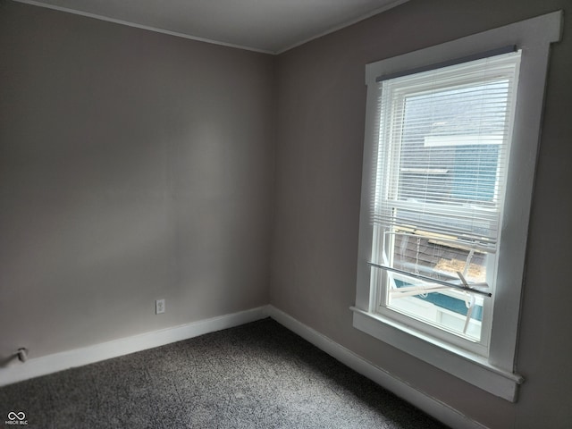 323-325 N Gladstone Ave, Indianapolis, IN 46201 - unfurnished room with baseboards, carpet flooring, and ornamental molding