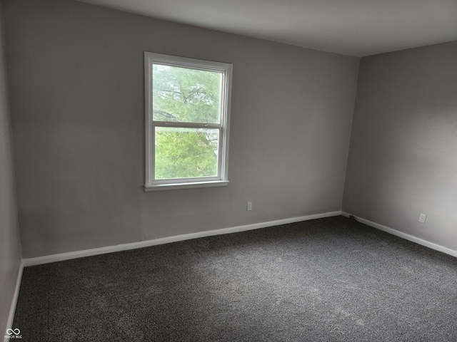323-325 N Gladstone Ave, Indianapolis, IN 46201 - carpeted spare room featuring baseboards