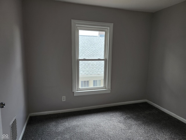323-325 N Gladstone Ave, Indianapolis, IN 46201 - carpeted spare room with baseboards