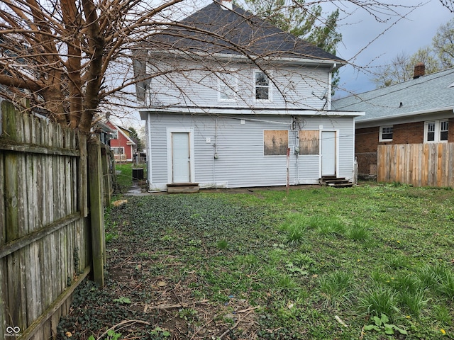 323-325 N Gladstone Ave, Indianapolis, IN 46201 - back of house with entry steps and central AC unit