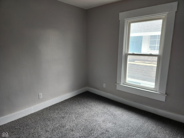 323-325 N Gladstone Ave, Indianapolis, IN 46201 - carpeted spare room featuring baseboards