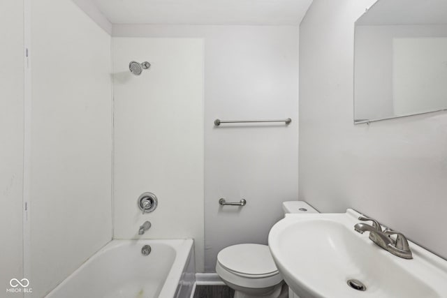 323-325 N Gladstone Ave, Indianapolis, IN 46201 - bathroom featuring a sink, toilet, and  shower combination