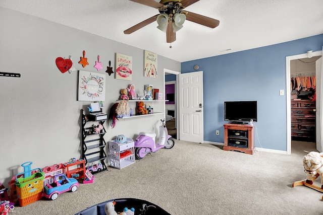 9001 Harrison Run Ct, Indianapolis, IN 46256 - recreation room featuring a ceiling fan, carpet flooring, and baseboards