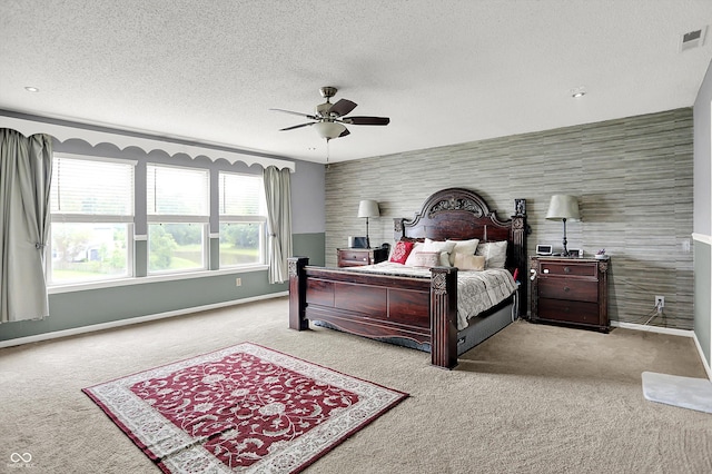 9001 Harrison Run Ct, Indianapolis, IN 46256 - carpeted bedroom featuring a textured ceiling, baseboards, and ceiling fan