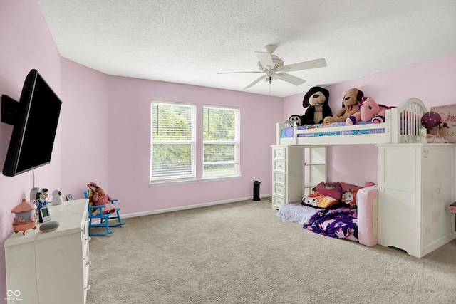 9001 Harrison Run Ct, Indianapolis, IN 46256 - carpeted bedroom with a textured ceiling, a ceiling fan, and baseboards