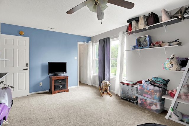 9001 Harrison Run Ct, Indianapolis, IN 46256 - game room with carpet flooring, a ceiling fan, baseboards, and a textured ceiling