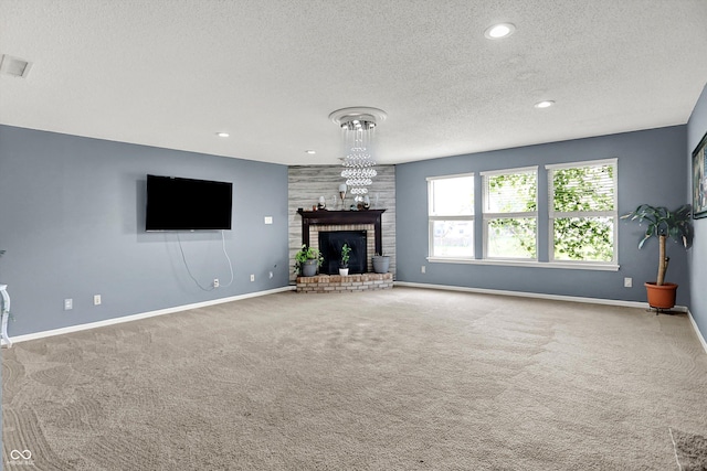 9001 Harrison Run Ct, Indianapolis, IN 46256 - unfurnished living room featuring a textured ceiling, a fireplace, carpet flooring, baseboards, and recessed lighting
