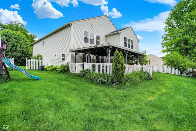 9001 Harrison Run Ct, Indianapolis, IN 46256 - back of house featuring a playground and central air condition unit