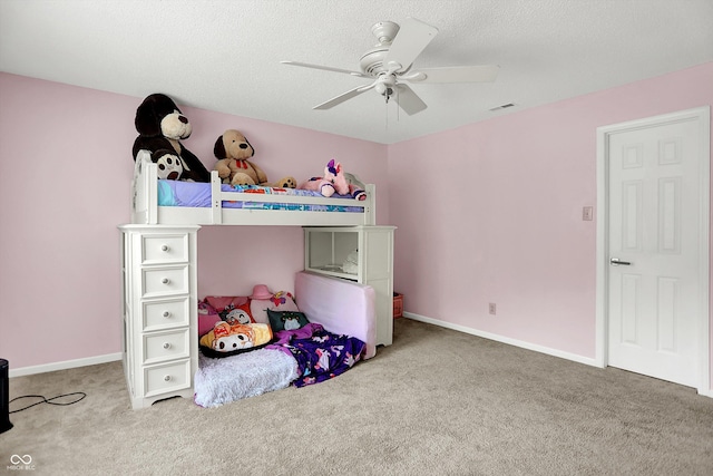 9001 Harrison Run Ct, Indianapolis, IN 46256 - carpeted bedroom with a ceiling fan, baseboards, and a textured ceiling