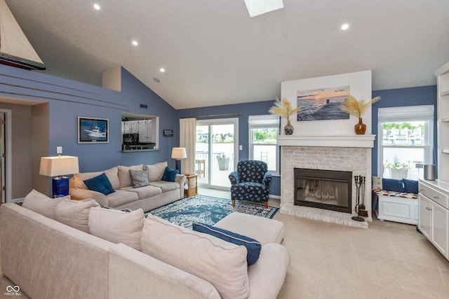 3403 Island Way, Indianapolis, IN 46214 - living room with recessed lighting, light colored carpet, a fireplace, and high vaulted ceiling