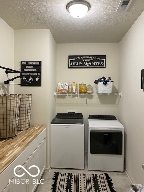 1349 Sunset Blvd, Avon, IN 46123 - laundry room with washing machine and dryer and a textured ceiling