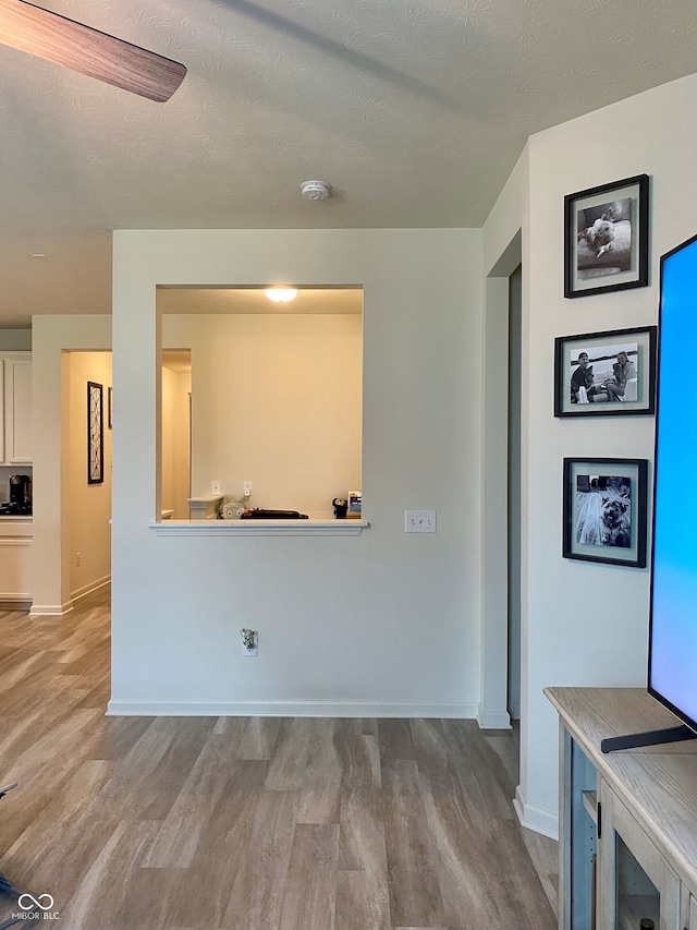 1349 Sunset Blvd, Avon, IN 46123 - unfurnished living room with wood finished floors and baseboards