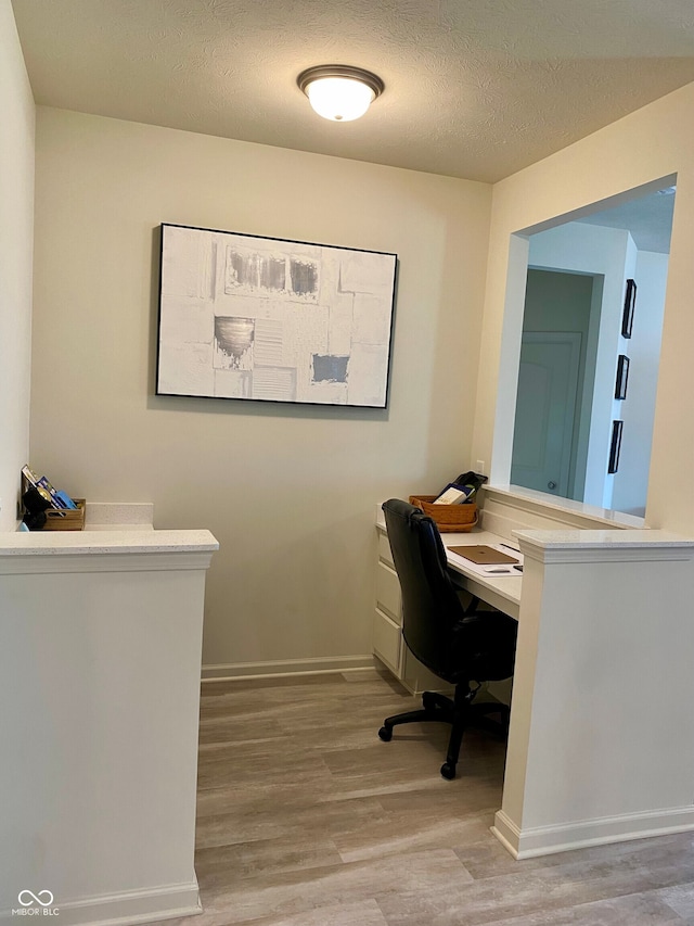 1349 Sunset Blvd, Avon, IN 46123 - office area featuring wood finished floors, a textured ceiling, and baseboards