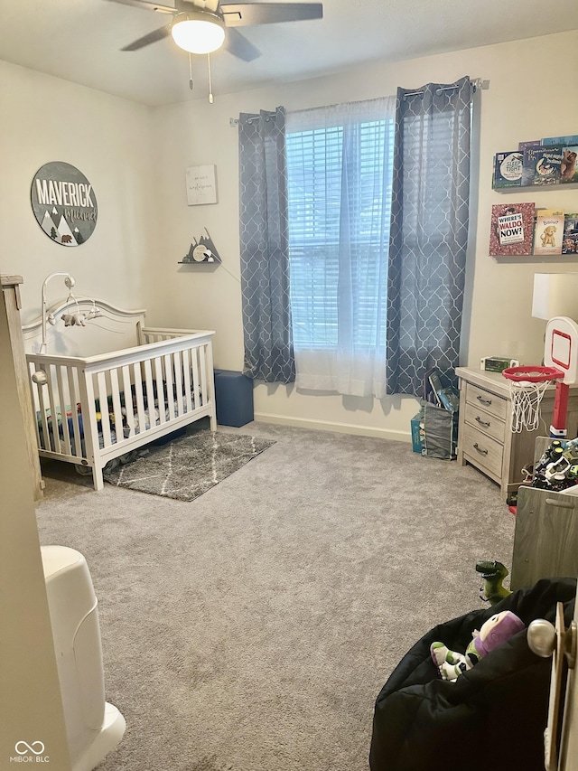 1349 Sunset Blvd, Avon, IN 46123 - carpeted bedroom featuring a nursery area and a ceiling fan