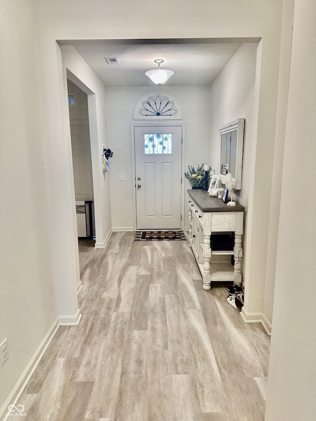1349 Sunset Blvd, Avon, IN 46123 - entrance foyer with light wood finished floors and baseboards