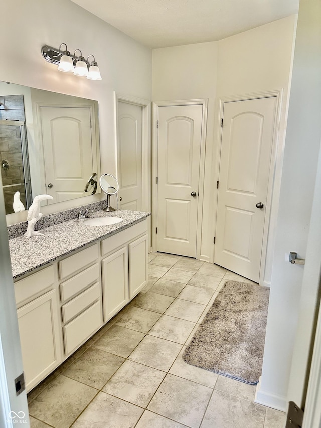 1349 Sunset Blvd, Avon, IN 46123 - bathroom with vanity, a shower stall, and tile patterned floors