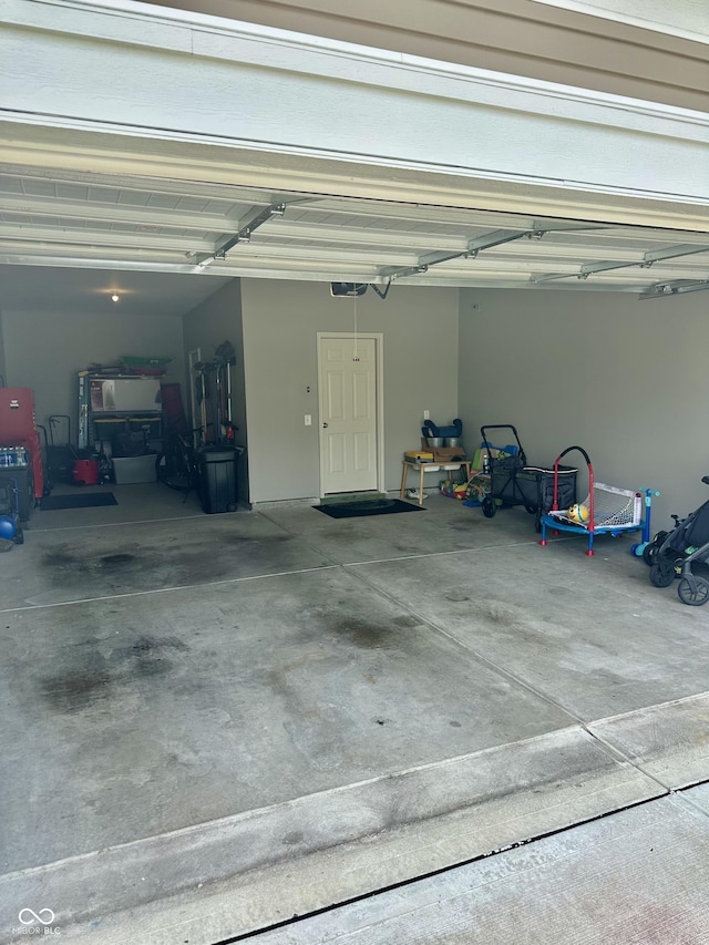 1349 Sunset Blvd, Avon, IN 46123 - garage featuring a garage door opener