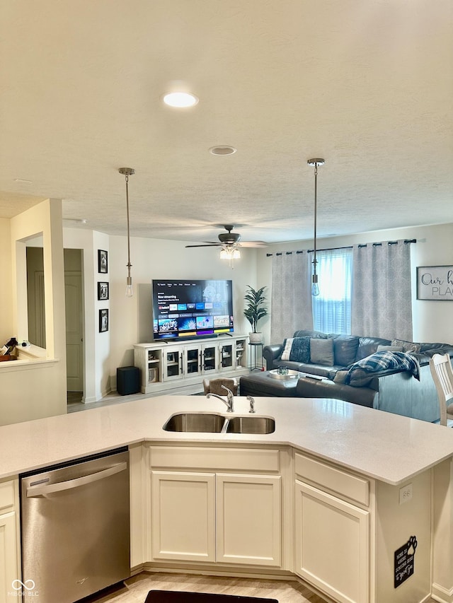 1349 Sunset Blvd, Avon, IN 46123 - kitchen with stainless steel dishwasher, open floor plan, light countertops, ceiling fan, and recessed lighting