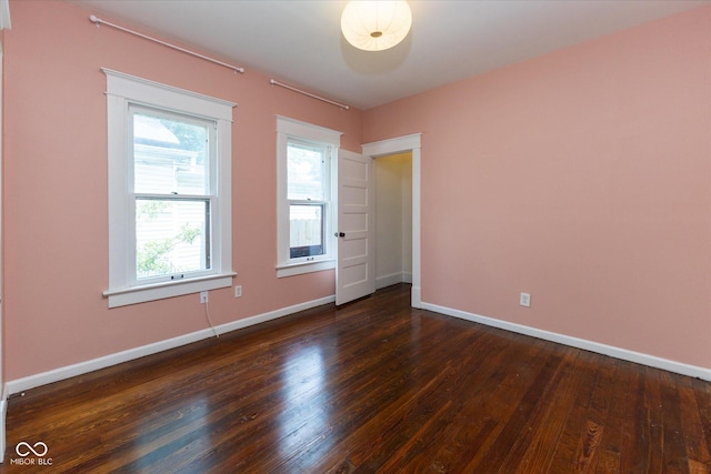 1311 N Oakland Ave, Indianapolis, IN 46201 - spare room with dark wood finished floors and baseboards