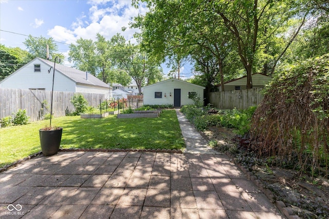 1311 N Oakland Ave, Indianapolis, IN 46201 - view of patio / terrace with a garden and an outdoor structure