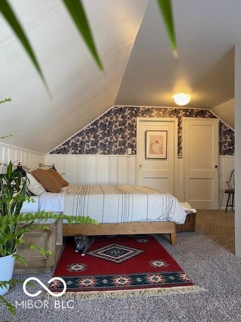 1311 N Oakland Ave, Indianapolis, IN 46201 - bedroom featuring lofted ceiling and carpet flooring