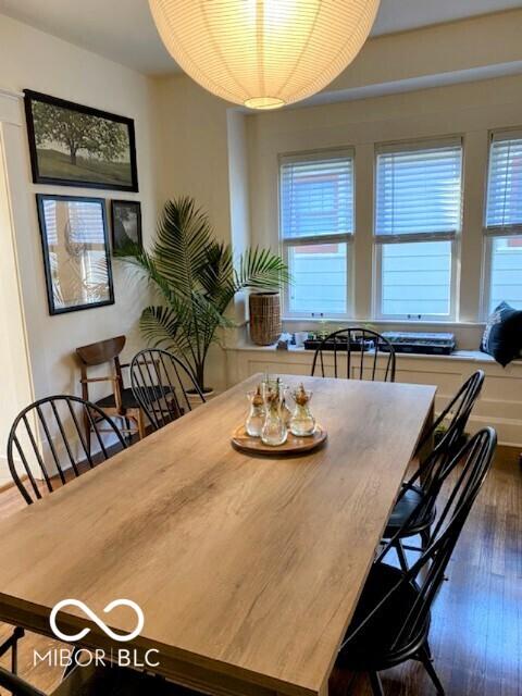 1311 N Oakland Ave, Indianapolis, IN 46201 - dining space featuring healthy amount of natural light and wood finished floors
