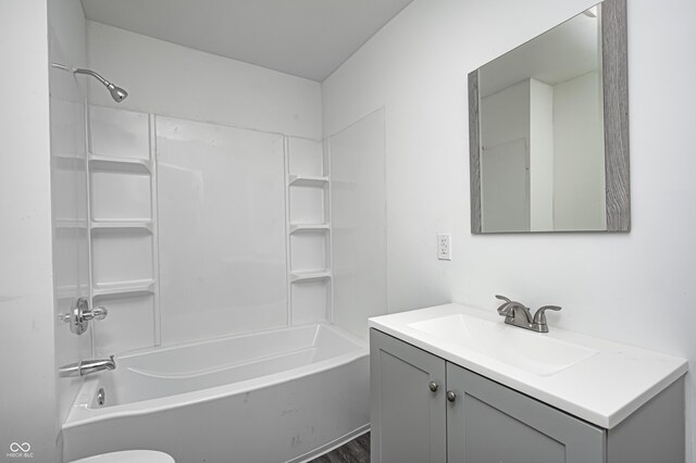 7414 Mendenhall Rd, Camby, IN 46113 - bathroom with vanity, shower / tub combination, toilet, and wood finished floors
