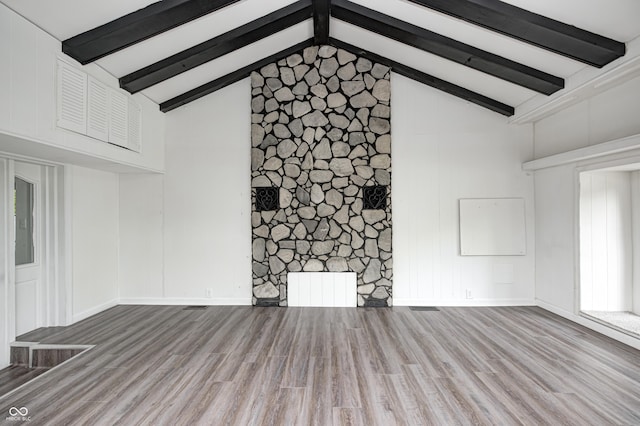 7414 Mendenhall Rd, Camby, IN 46113 - unfurnished living room featuring wood finished floors and a decorative wall