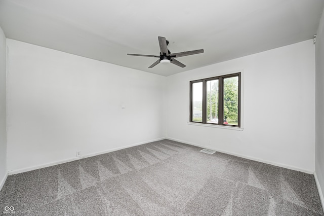 7414 Mendenhall Rd, Camby, IN 46113 - unfurnished room with carpet, a ceiling fan, and baseboards