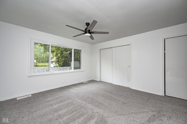 7414 Mendenhall Rd, Camby, IN 46113 - unfurnished bedroom with carpet flooring, baseboards, a ceiling fan, and a closet