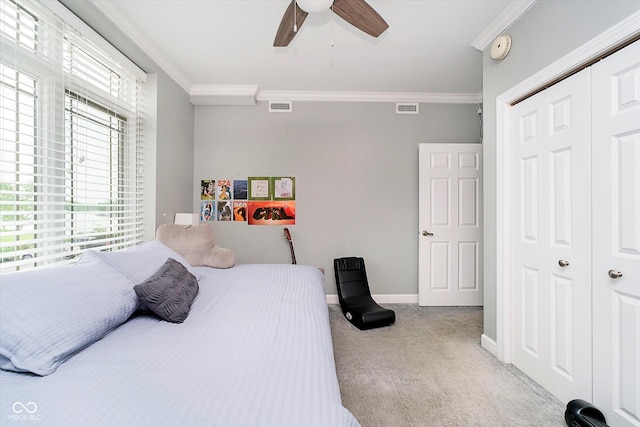 20971 Shoreline Ct Unit 201, Noblesville, IN 46062 - carpeted bedroom with crown molding, a closet, and a ceiling fan