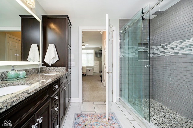20971 Shoreline Ct Unit 201, Noblesville, IN 46062 - bathroom with a stall shower, double vanity, tile patterned flooring, and a ceiling fan