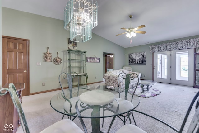2025 Flamingo Way, Franklin, IN 46131 - carpeted dining space with vaulted ceiling, ceiling fan, baseboards, and a chandelier