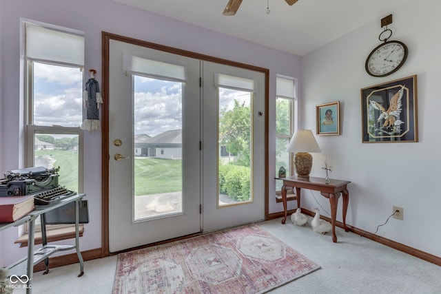 2025 Flamingo Way, Franklin, IN 46131 - doorway to outside featuring carpet floors, baseboards, and ceiling fan