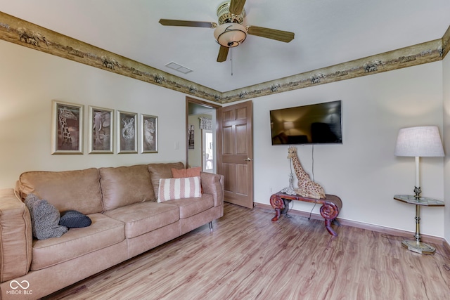 2025 Flamingo Way, Franklin, IN 46131 - living room featuring ceiling fan, wood finished floors, and baseboards