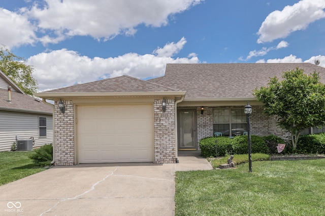 2025 Flamingo Way, Franklin, IN 46131 - ranch-style house with concrete driveway, central AC, a garage, and a front lawn
