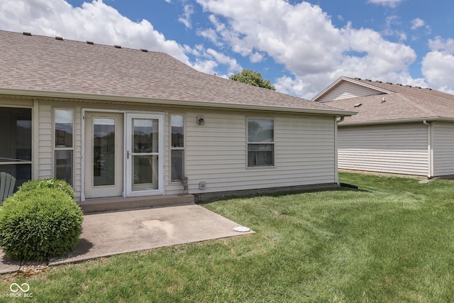 2025 Flamingo Way, Franklin, IN 46131 - back of property featuring a shingled roof, a yard, and a patio