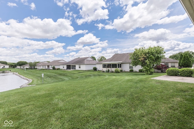 2025 Flamingo Way, Franklin, IN 46131 - view of grassy yard featuring a residential view and a water view