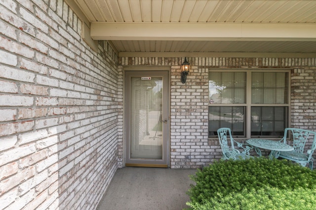 2025 Flamingo Way, Franklin, IN 46131 - property entrance with brick siding and a porch