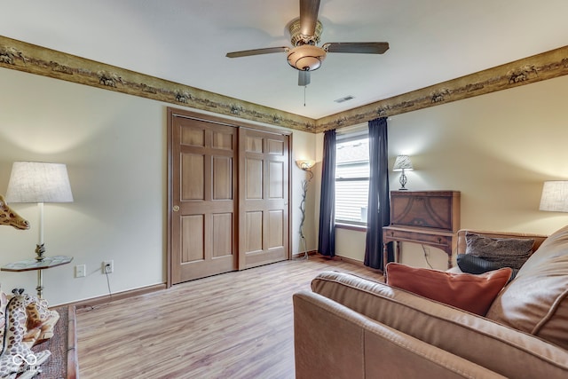 2025 Flamingo Way, Franklin, IN 46131 - living area with light wood-style flooring, a ceiling fan, and baseboards