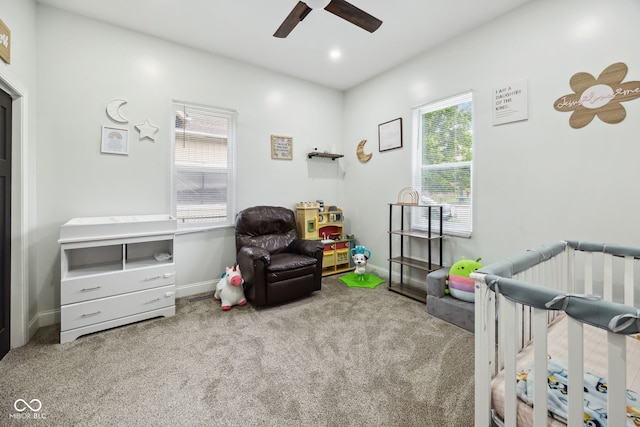 117 N Market St, Thorntown, IN 46071 - bedroom featuring carpet floors, a crib, ceiling fan, and baseboards