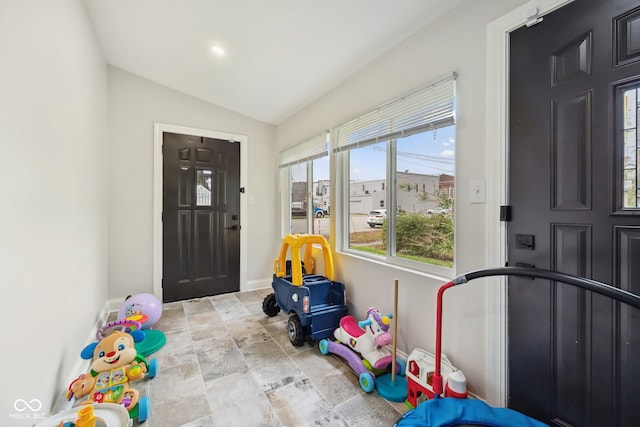117 N Market St, Thorntown, IN 46071 - entrance foyer with baseboards, vaulted ceiling, and stone finish flooring