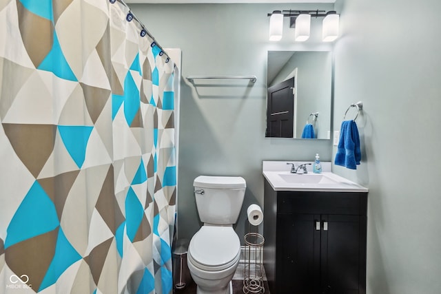 117 N Market St, Thorntown, IN 46071 - bathroom featuring vanity, toilet, and a shower with shower curtain