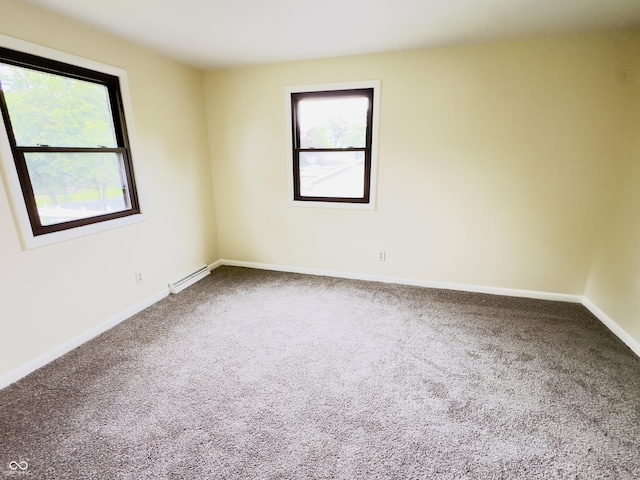 5130 Navajo Ct, Columbus, IN 47203 - unfurnished room with carpet, baseboard heating, and baseboards