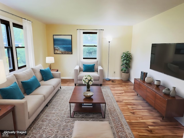 5130 Navajo Ct, Columbus, IN 47203 - living area with light wood-type flooring and baseboards