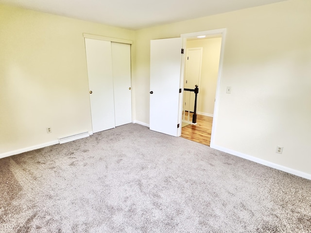 5130 Navajo Ct, Columbus, IN 47203 - unfurnished bedroom with carpet flooring, baseboards, and a closet