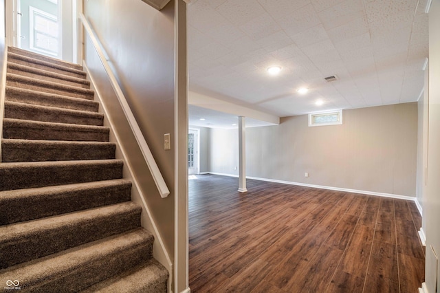 1920 E Wexley Rd, Bloomington, IN 47401 - below grade area with dark wood-style flooring and stairway