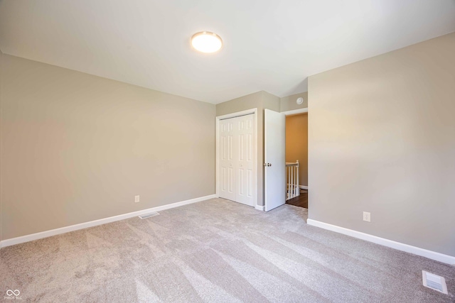 1920 E Wexley Rd, Bloomington, IN 47401 - unfurnished bedroom featuring carpet flooring and a closet
